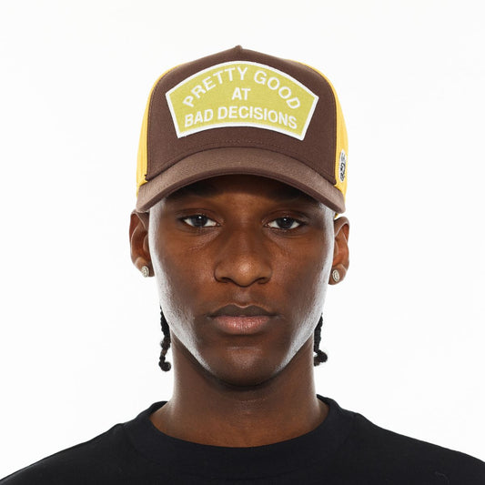 LOGO MESH BACK TRUCKER HAT "GOOD AT BAD DECISIONS"