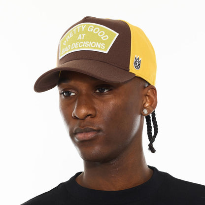 LOGO MESH BACK TRUCKER HAT "GOOD AT BAD DECISIONS"
